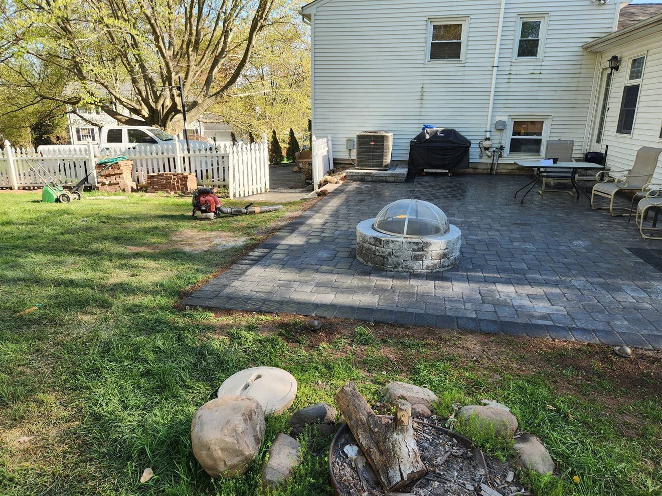 Wide view of the completed backyard paver patio