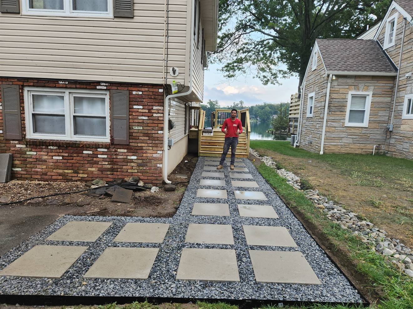 Stepping-stone path beside the completed raised patio
