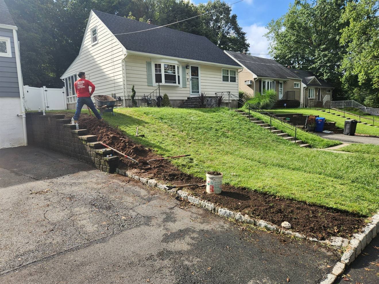 Driveway edge before retaining-wall construction