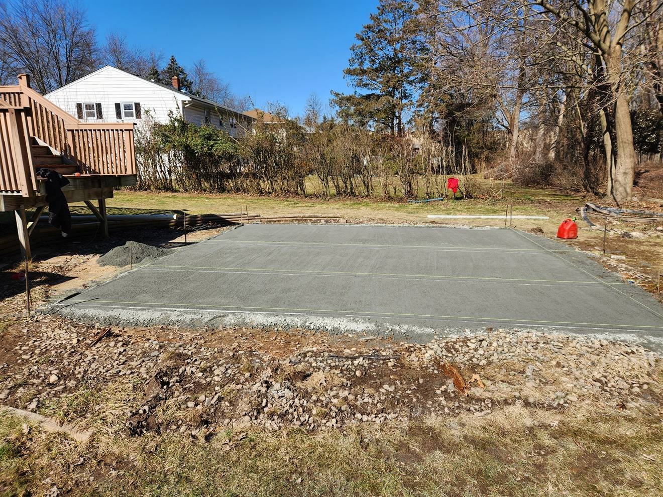 Prepared rectangular base area for a backyard patio
