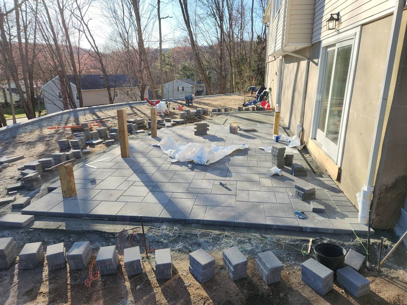 Large paver patio during layout and installation