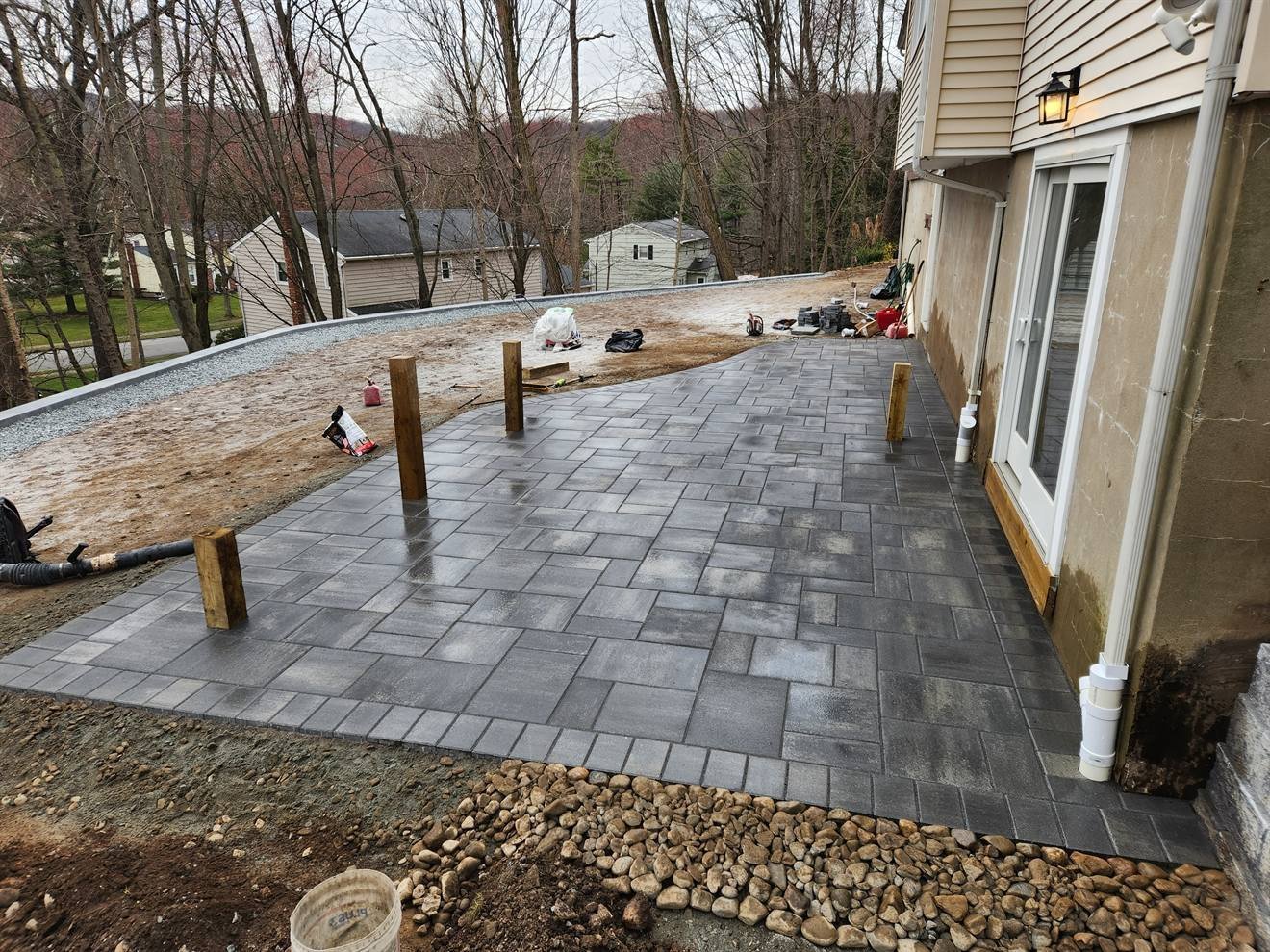 Broad paver patio with curved outside edge