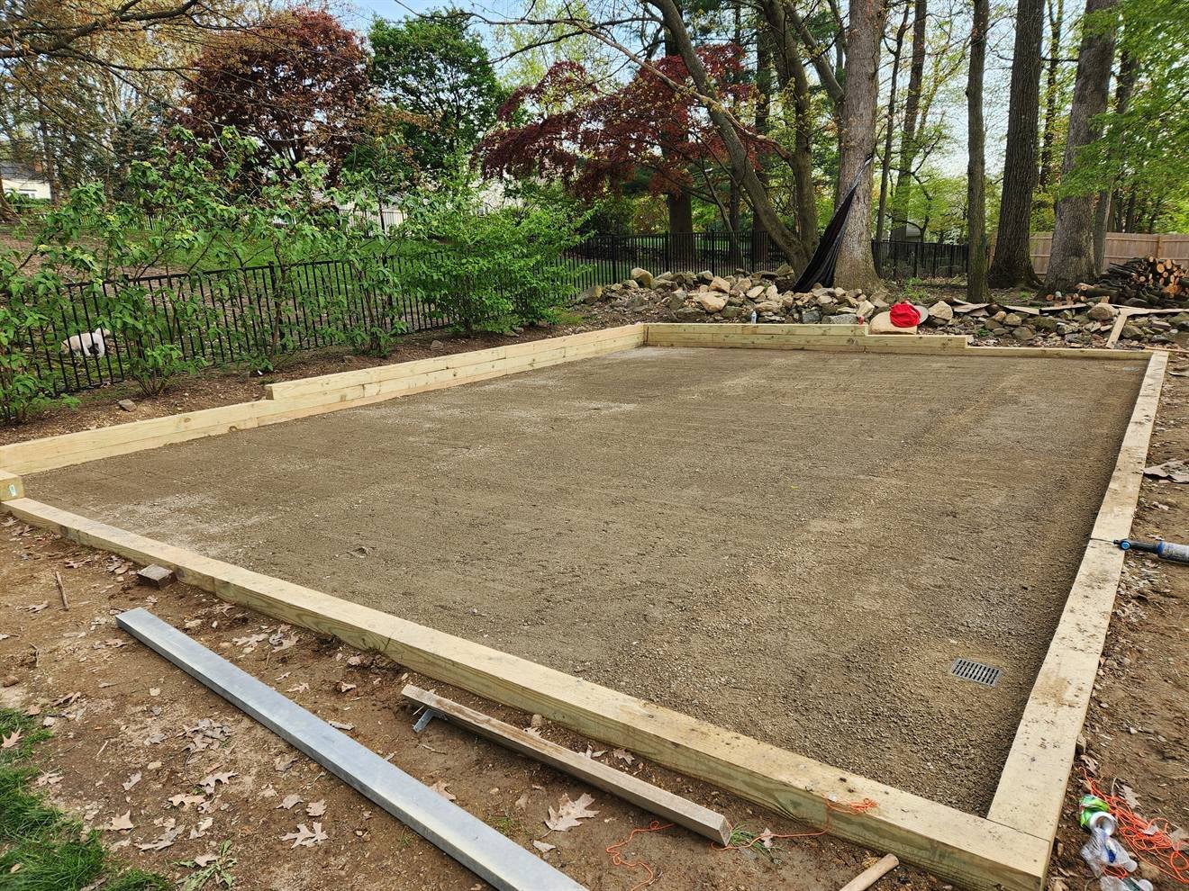 Compacted base prepared for the new curved patio