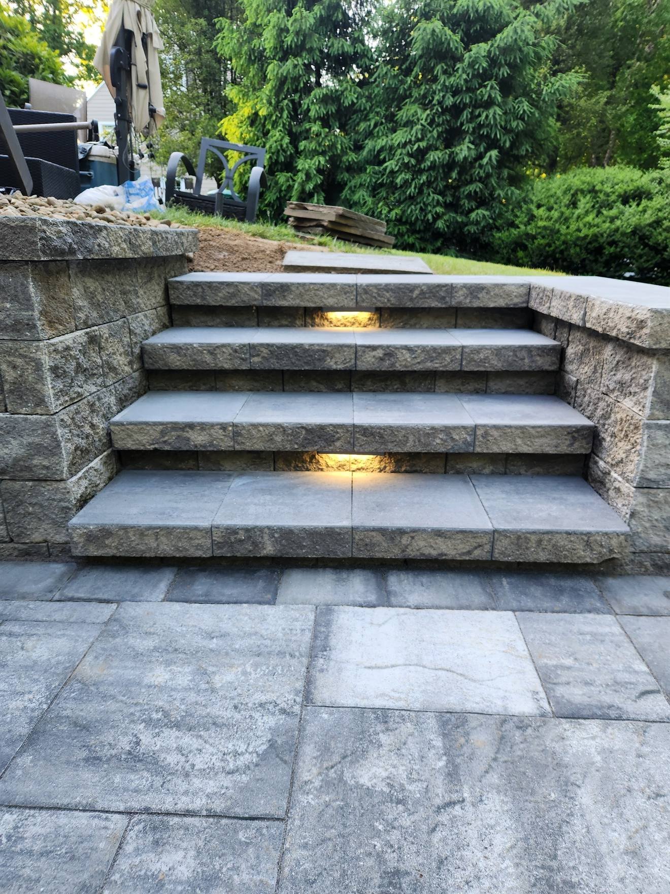 Masonry steps with integrated low-voltage lighting