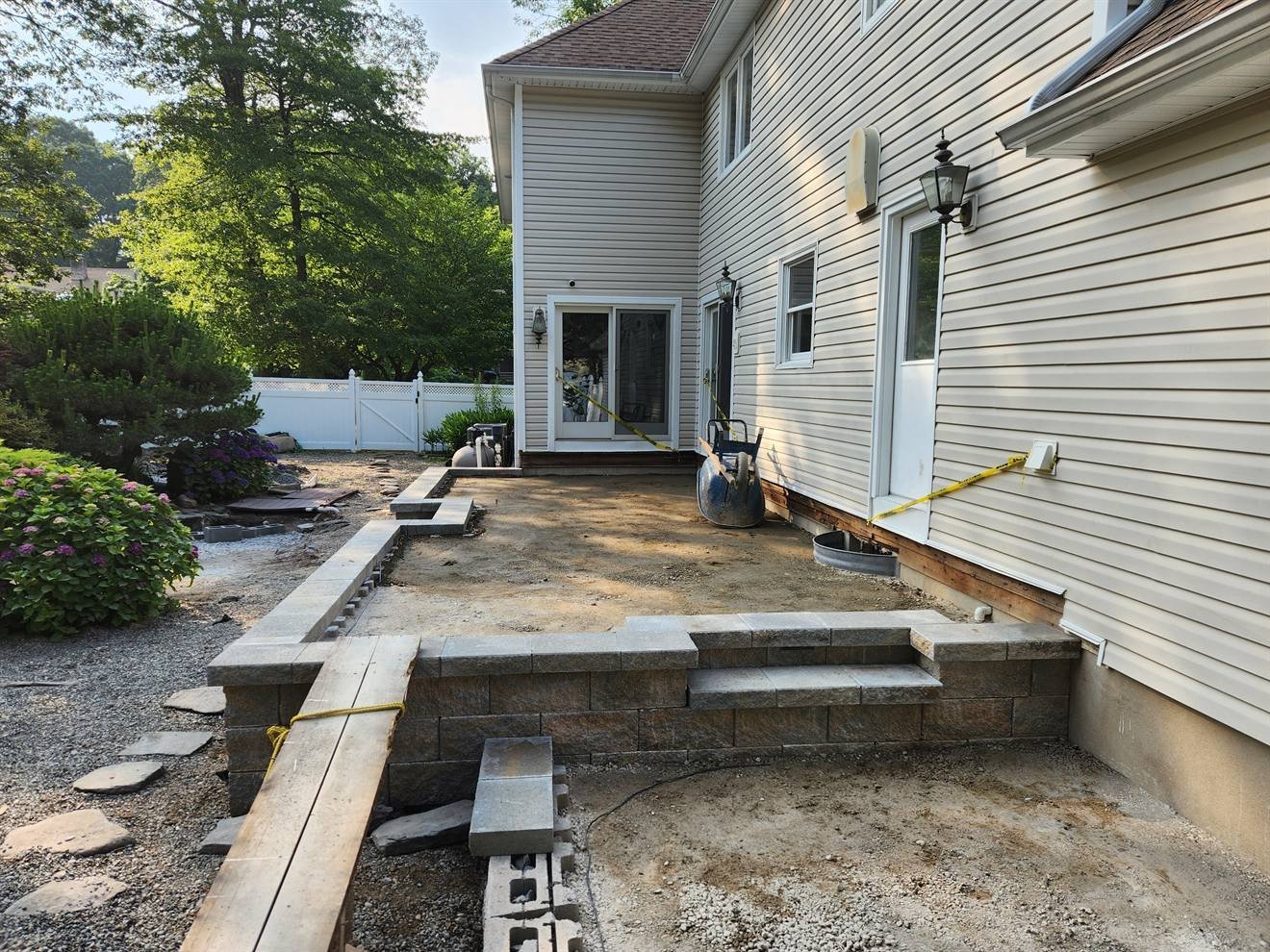 Multi-level patio and step layout during preparation