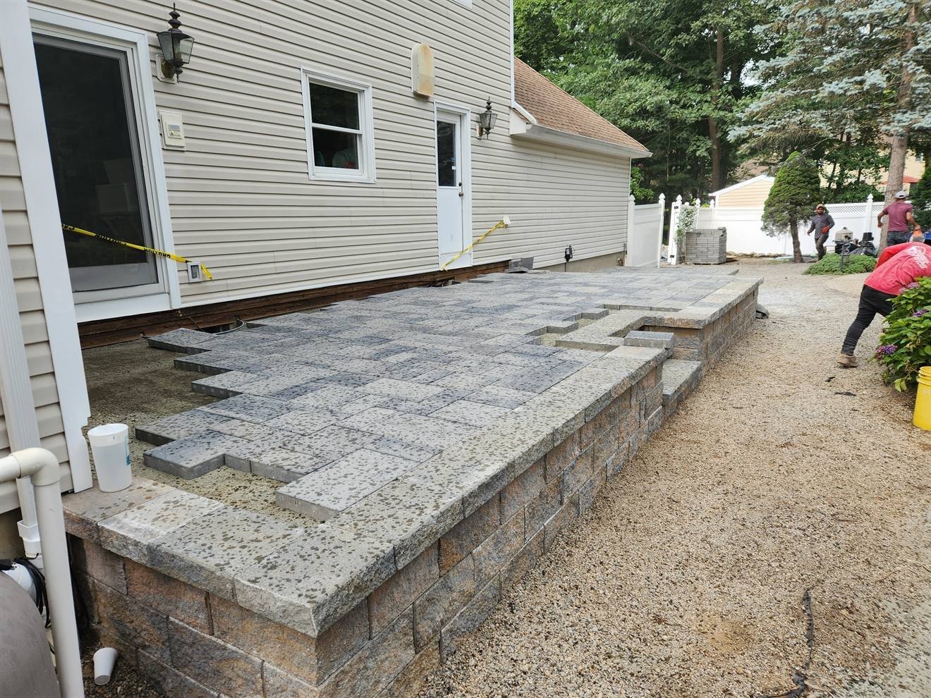Retaining edge and upper patio level during construction